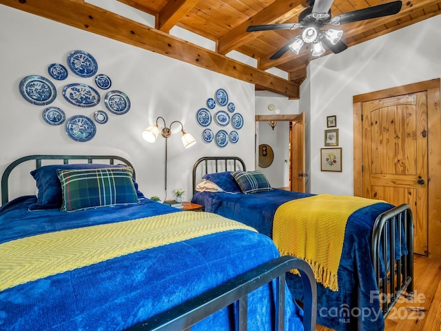 120 Rocky Mountain Dr, Lake Lure, NC 28746 - bedroom featuring a wooden ceiling with exposed beams, wood finished floors, and ceiling fan