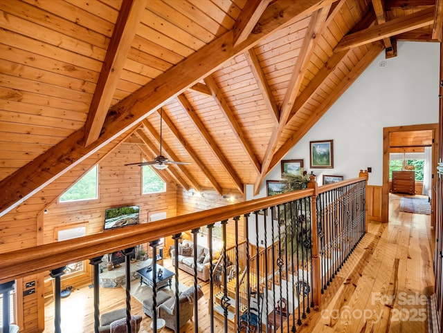 120 Rocky Mountain Dr, Lake Lure, NC 28746 - hallway with wooden ceiling, light wood-type flooring, wood walls, and a wainscoted wall