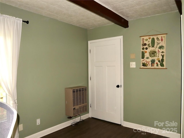 1 Fullam Dr, Arden, NC 28704 - unfurnished bedroom with heating unit, dark wood-style floors, baseboards, and beamed ceiling