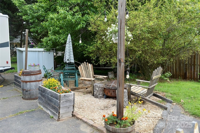 1 Fullam Dr, Arden, NC 28704 - view of patio / terrace featuring an outdoor fire pit