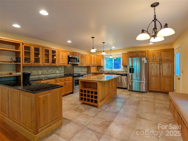 355 Rosewood Ln, Burnsville, NC 28714 - kitchen featuring appliances with stainless steel finishes, open shelves, decorative backsplash, dark stone countertops, and recessed lighting