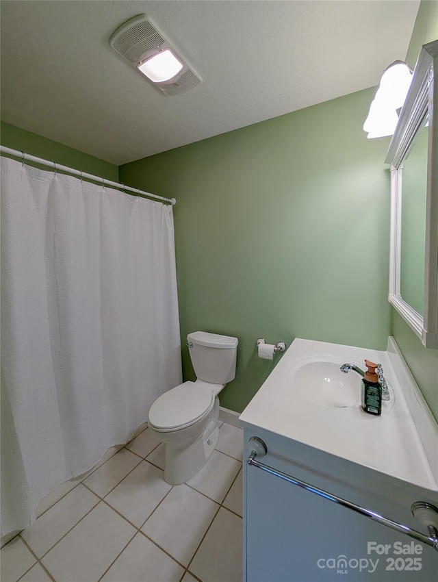 355 Rosewood Ln, Burnsville, NC 28714 - full bathroom with vanity, toilet, and tile patterned floors