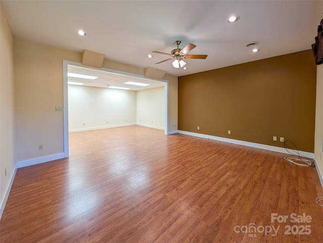 355 Rosewood Ln, Burnsville, NC 28714 - spare room featuring ceiling fan, light wood-style flooring, recessed lighting, and baseboards