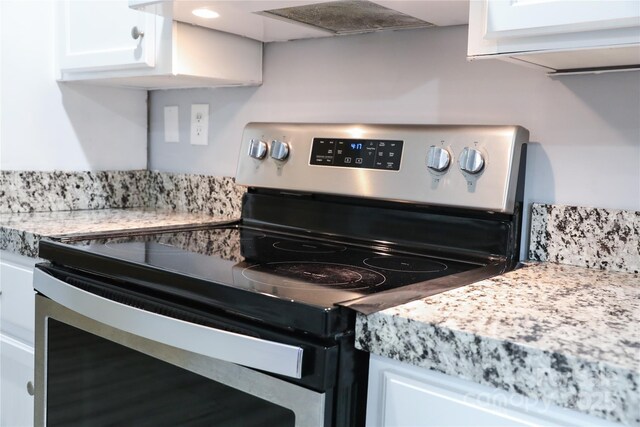 1184 Sherwood Rd, Clover, SC 29710 - kitchen featuring stainless steel range with electric stovetop and white cabinets
