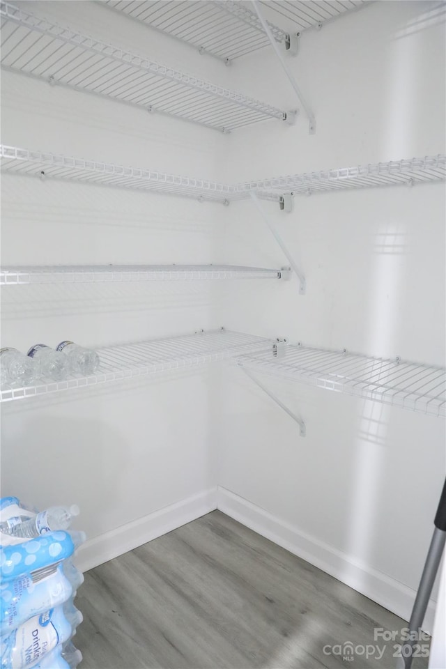 1184 Sherwood Rd, Clover, SC 29710 - walk in closet with wood finished floors