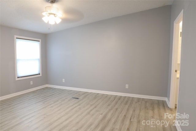 1184 Sherwood Rd, Clover, SC 29710 - empty room with light wood finished floors, ceiling fan, and baseboards
