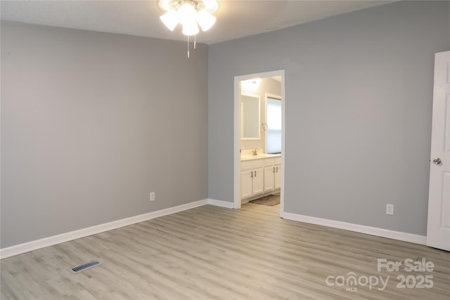1184 Sherwood Rd, Clover, SC 29710 - spare room with a ceiling fan, light wood-style floors, baseboards, and a sink