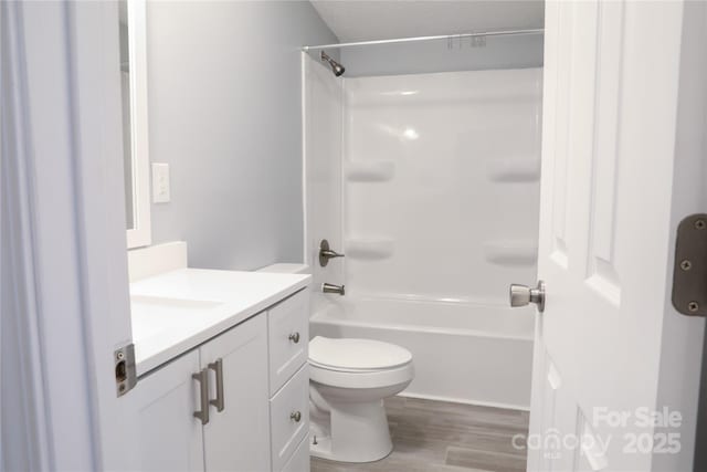 1184 Sherwood Rd, Clover, SC 29710 - full bath featuring vanity, toilet, wood finished floors, and tub / shower combination