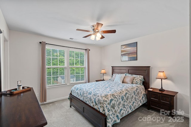 7339 Millstone Cir SW, Concord, NC 28025 - bedroom featuring baseboards, light colored carpet, and a ceiling fan