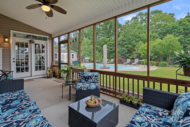 7339 Millstone Cir SW, Concord, NC 28025 - sunroom / solarium with vaulted ceiling, a ceiling fan, and view of wooded area