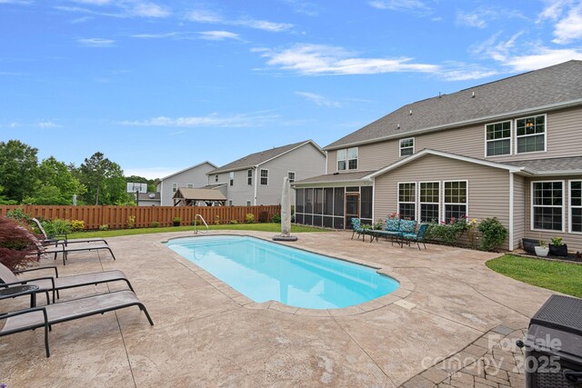 7339 Millstone Cir SW, Concord, NC 28025 - view of pool with a sunroom, a patio, and a fenced backyard