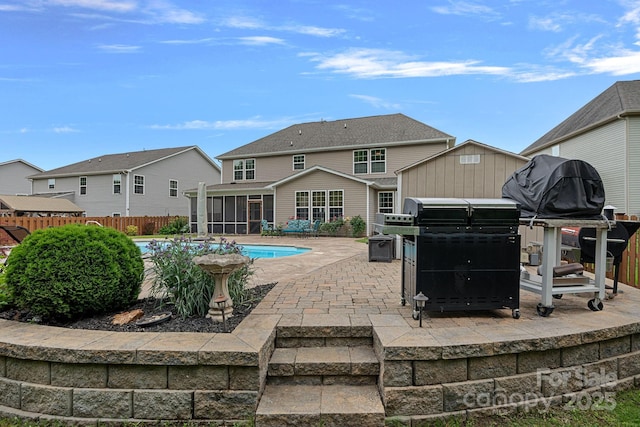 7339 Millstone Cir SW, Concord, NC 28025 - back of property with a sunroom, a patio, and a hot tub