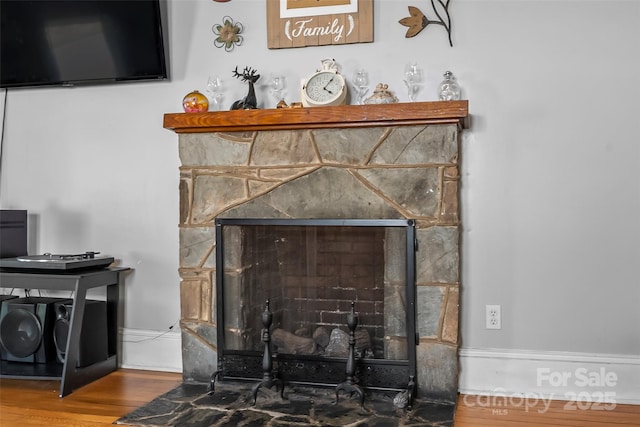 302 N St, Morganton, NC 28655 - detailed view of a stone fireplace and wood finished floors