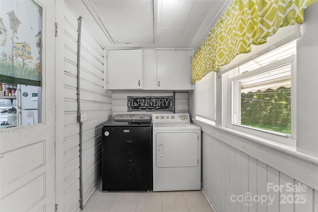 302 N St, Morganton, NC 28655 - laundry area featuring cabinet space, separate washer and dryer, attic access, and light tile patterned flooring
