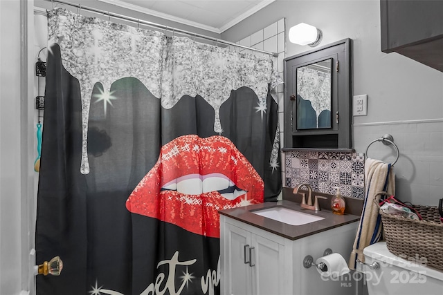 302 N St, Morganton, NC 28655 - bathroom featuring toilet, vanity, ornamental molding, a shower with shower curtain, and tile walls
