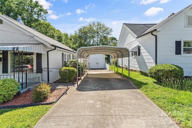302 N St, Morganton, NC 28655 - view of car parking with driveway and a detached carport