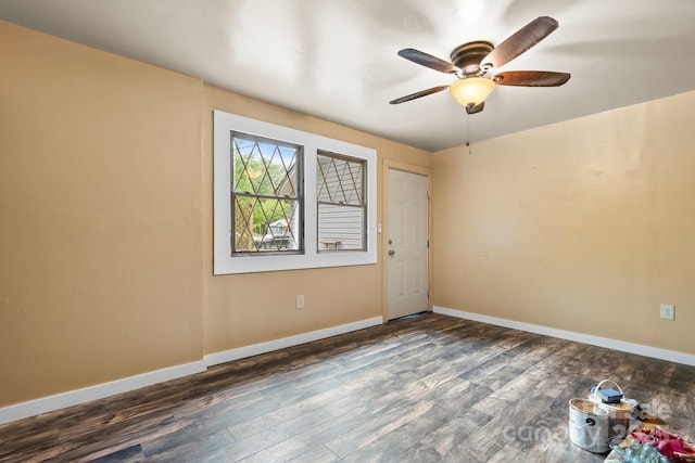 352 18th Ave NE, Hickory, NC 28601 - empty room featuring dark wood-style flooring, baseboards, and a ceiling fan