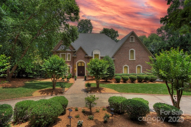 4323 Rosecliff Dr, Charlotte, NC 28277 - view of front facade featuring brick siding and a yard