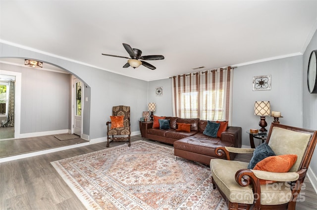 12504 Culp Rd, Gold Hill, NC 28071 - living area featuring arched walkways, wood finished floors, crown molding, and a ceiling fan