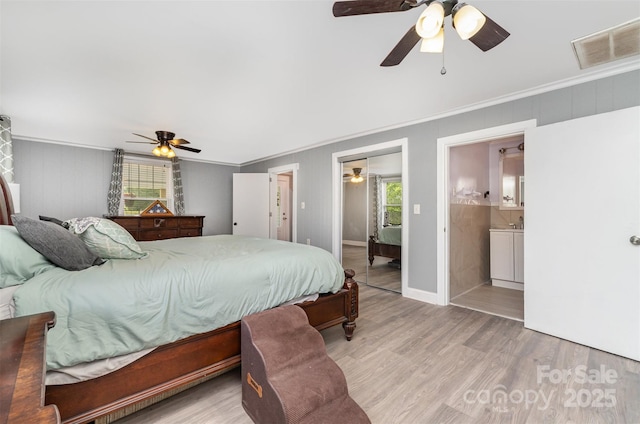 12504 Culp Rd, Gold Hill, NC 28071 - bedroom with crown molding, light wood-style floors, ceiling fan, and ensuite bath