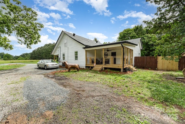 12504 Culp Rd, Gold Hill, NC 28071 - back of property featuring a ceiling fan, driveway, and a wooden deck