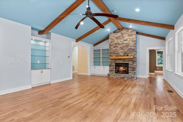 311 Carriage Crest Dr, Hendersonville, NC 28791 - unfurnished living room featuring ceiling fan, light wood-style floors, a stone fireplace, recessed lighting, and baseboards