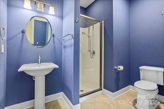 311 Carriage Crest Dr, Hendersonville, NC 28791 - bathroom featuring a shower stall and tile patterned flooring