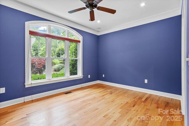 311 Carriage Crest Dr, Hendersonville, NC 28791 - empty room featuring wood finished floors, baseboards, ceiling fan, crown molding, and recessed lighting