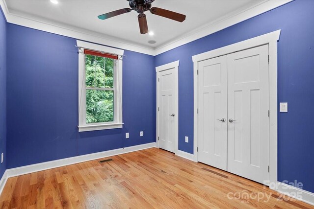 311 Carriage Crest Dr, Hendersonville, NC 28791 - unfurnished bedroom with baseboards, light wood-type flooring, ornamental molding, and a ceiling fan