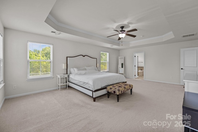 1300 Yellow Springs Dr, Indian Land, SC 29707 - carpeted bedroom featuring a raised ceiling, ornamental molding, baseboards, a ceiling fan, and connected bathroom