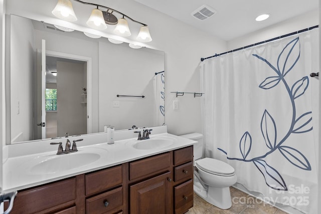 1300 Yellow Springs Dr, Indian Land, SC 29707 - full bathroom with toilet, double vanity, tile patterned floors, and a shower with curtain
