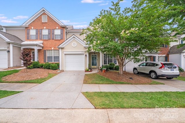 11714 Harsworth Ln, Charlotte, NC 28277 - view of front of property with driveway, brick siding, and a garage