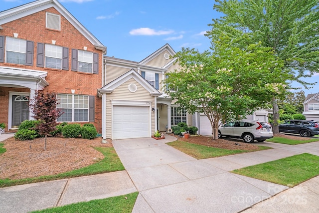 11714 Harsworth Ln, Charlotte, NC 28277 - townhome / multi-family property with driveway, brick siding, and an attached garage