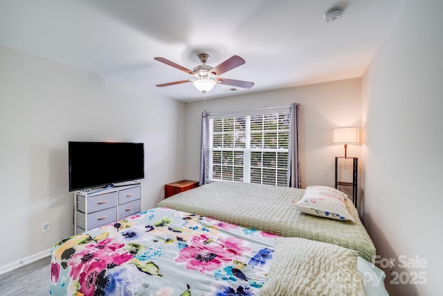 11714 Harsworth Ln, Charlotte, NC 28277 - bedroom with a ceiling fan and baseboards