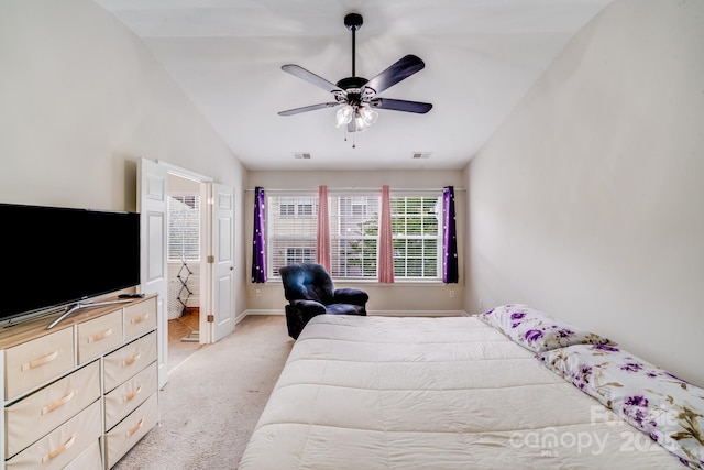 11714 Harsworth Ln, Charlotte, NC 28277 - bedroom with light carpet, vaulted ceiling, baseboards, ceiling fan, and ensuite bathroom
