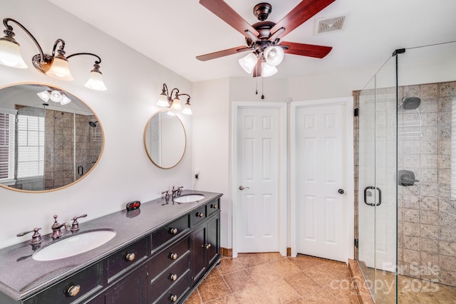 11714 Harsworth Ln, Charlotte, NC 28277 - bathroom featuring double vanity, ceiling fan, and a shower stall