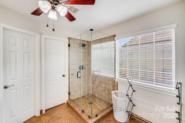11714 Harsworth Ln, Charlotte, NC 28277 - bathroom with a shower stall, a ceiling fan, and tile patterned flooring