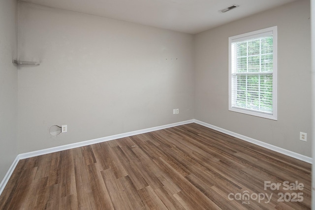 8432 Spirea Ct, Charlotte, NC 28215 - empty room featuring baseboards and dark wood finished floors