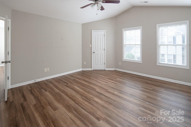 8432 Spirea Ct, Charlotte, NC 28215 - spare room with ceiling fan, vaulted ceiling, wood finished floors, and baseboards
