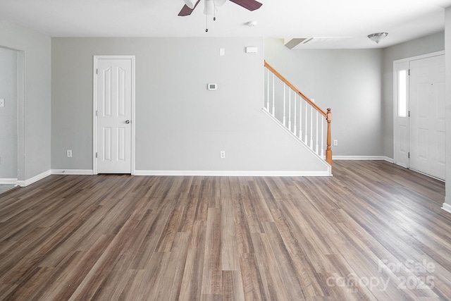 8432 Spirea Ct, Charlotte, NC 28215 - unfurnished living room featuring a ceiling fan, stairs, wood finished floors, and baseboards