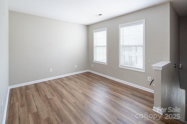 8432 Spirea Ct, Charlotte, NC 28215 - unfurnished room featuring wood finished floors and baseboards