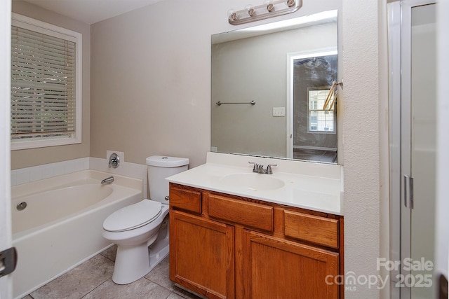 8432 Spirea Ct, Charlotte, NC 28215 - bathroom with vanity, a bath, tile patterned floors, and toilet