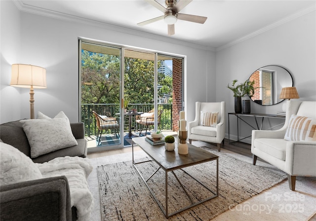 300 W Fifth St Unit 509, Charlotte, NC 28202 - living room featuring wood finished floors, ceiling fan, ornamental molding, and baseboards