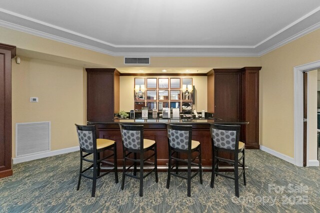 300 W Fifth St Unit 509, Charlotte, NC 28202 - community bar area with ornamental molding and dark colored carpet