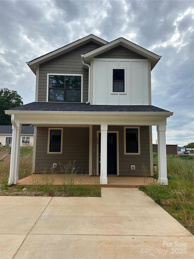 804 3rd Street Pl SW, Hickory, NC 28602 - view of front of house with a porch and board and batten siding