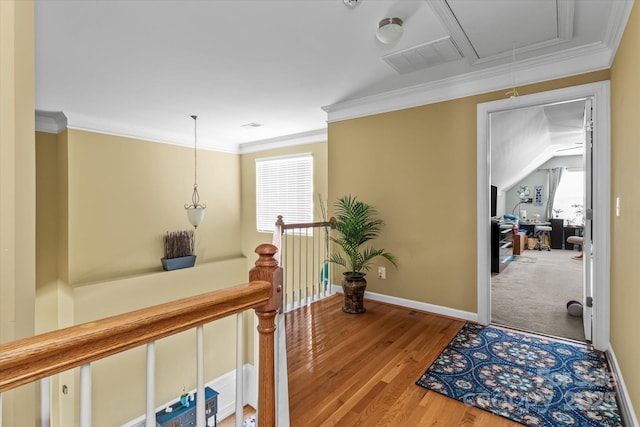 108 Planters Dr, Statesville, NC 28677 - hall with attic access, baseboards, wood finished floors, ornamental molding, and an upstairs landing