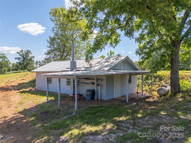 983 Stroud Rd, Ellenboro, NC 28040 - rear view of property with metal roof