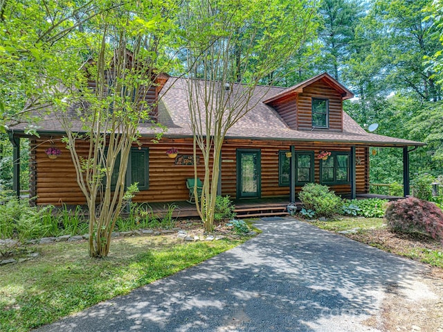 95 Idlewood Dr, Marion, NC 28752 - cabin featuring a porch, log exterior, and roof with shingles