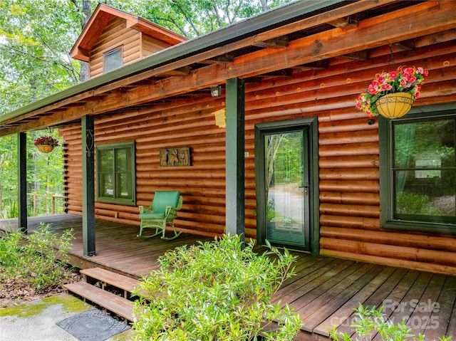 95 Idlewood Dr, Marion, NC 28752 - doorway to property featuring a wooden deck and faux log siding