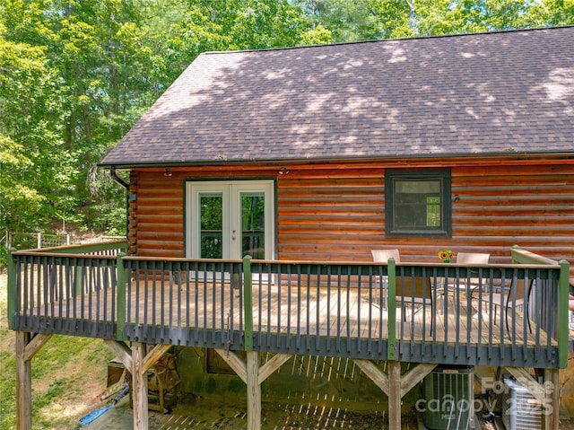 95 Idlewood Dr, Marion, NC 28752 - rear view of house with log siding, a deck, and roof with shingles